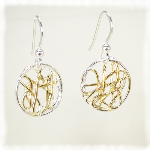 Silver wire disc earrings with gold highlights